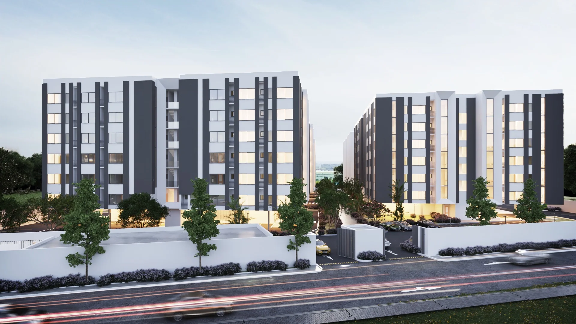 Contemporary apartment blocks at dusk representing Toll Brothers